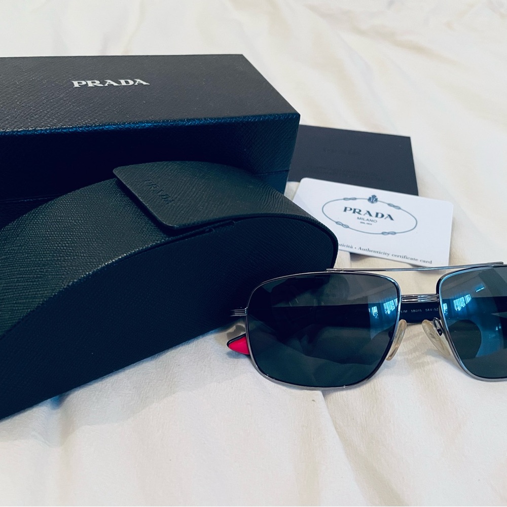 Prada Dark Sunglasses with Sleek Case